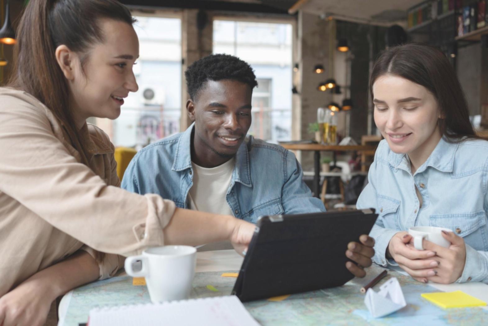 Modern financial analysis workspace with multiple screens displaying business analytics dashboards and real-time performance metrics